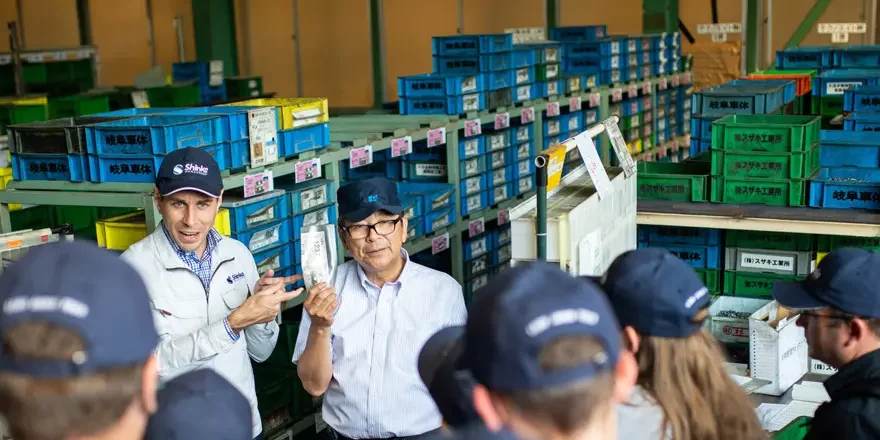 Participants joining a kaizen tour to learn about lean manufacturing